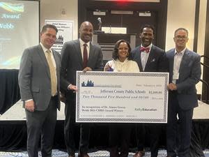 Left to right, Jefferson County Public Schools Superintendent Marty Pollio, Council Executive Director Ray Hart, Aimee Green-Webb, Council Director Willie Burroughs and Kelly Education Al Teixeira