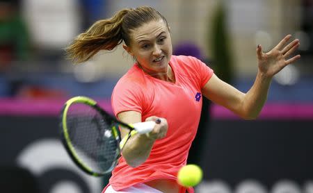 Tennis - Fed Cup Final - Belarus v United States - rubber 1 - Chizhovka Arena, Minsk, Belarus, November 11, 2017 - Aliaksandra Sasnovich of Belarus in action against Coco Vandeweghe of the U.S. REUTERS/Vasily Fedosenko