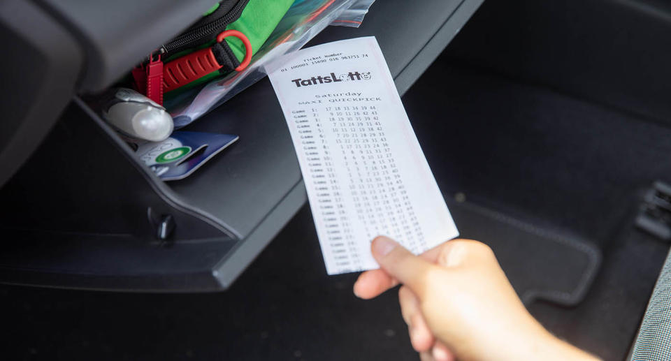 Lottery ticket in car glove box. Source: The Lott