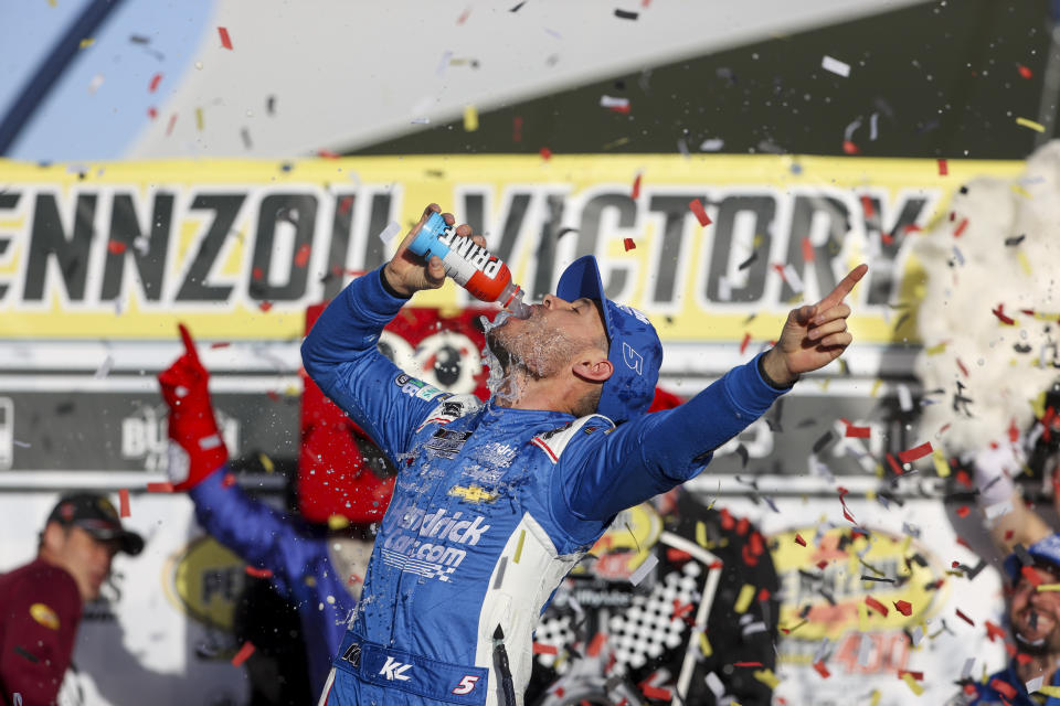 Kyle Larson celebrates after winning a NASCAR Cup Series auto race at Las Vegas Motor Speedway, Sunday, March 3, 2024, in Las Vegas. (AP Photo/Ian Maule)