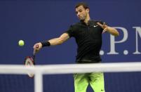 Sep 5, 2016; New York, NY, USA; Grigor Dmitrov of Bulgaria hits a forehand against Andy Murray of Great Britain (not pictured) on day eight of the 2016 U.S. Open tennis tournament at USTA Billie Jean King National Tennis Center. Mandatory Credit: Geoff Burke-USA TODAY Sports