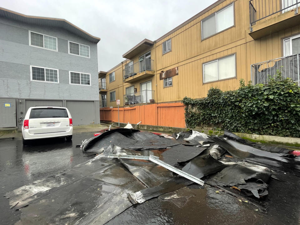 Renter Jose Alvarez and his family lived in the South San Francisco apartment building that had its roof partially blown off by wind gust in San Francisco, Wednesday, Jan. 11, 2023. (AP Photo/Haven Daley)