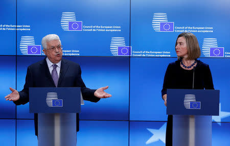 Palestinian President Mahmoud Abbas and European High Representative for Foreign Affairs Federica Mogherini give a press statement before a meeting with European Union foreign ministers in Brussels, Belgium, January 22, 2018. REUTERS/Yves Herman