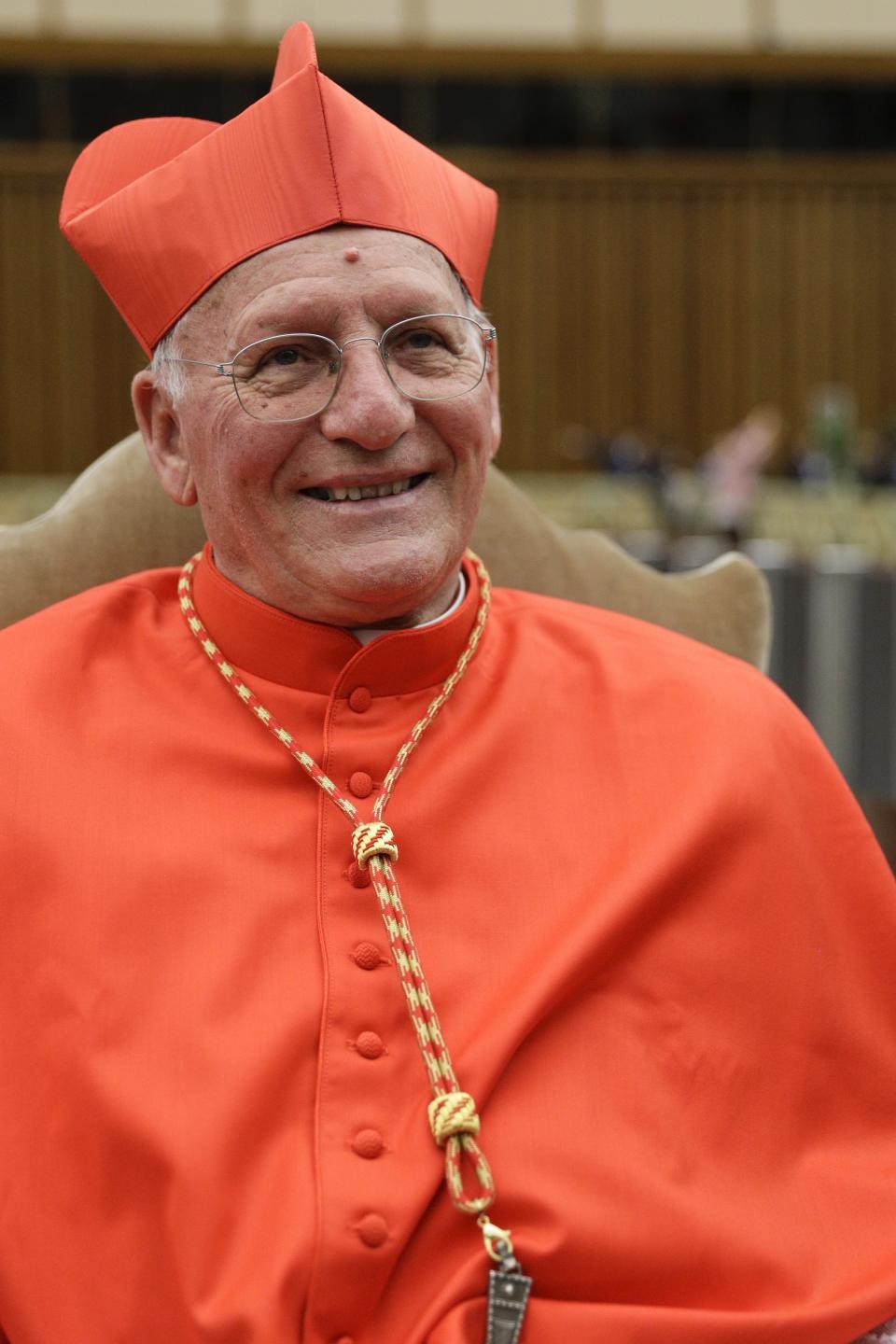 Cardinal Eugenio Dal Corso poses for photographers prior to meeting relatives and friends after he was elevated to cardinal by Pope Francis, at the Vatican, Saturday, Oct. 5, 2019. Pope Francis has chosen 13 men he admires and whose sympathies align with his to become the Catholic Church's newest cardinals. (AP Photo/Andrew Medichini)