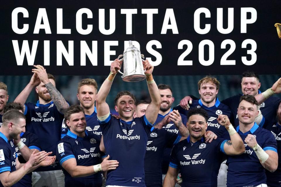 Celebration: Scotland have won the Calcutta Cup for the third year in a row at Twickenham  (PA)