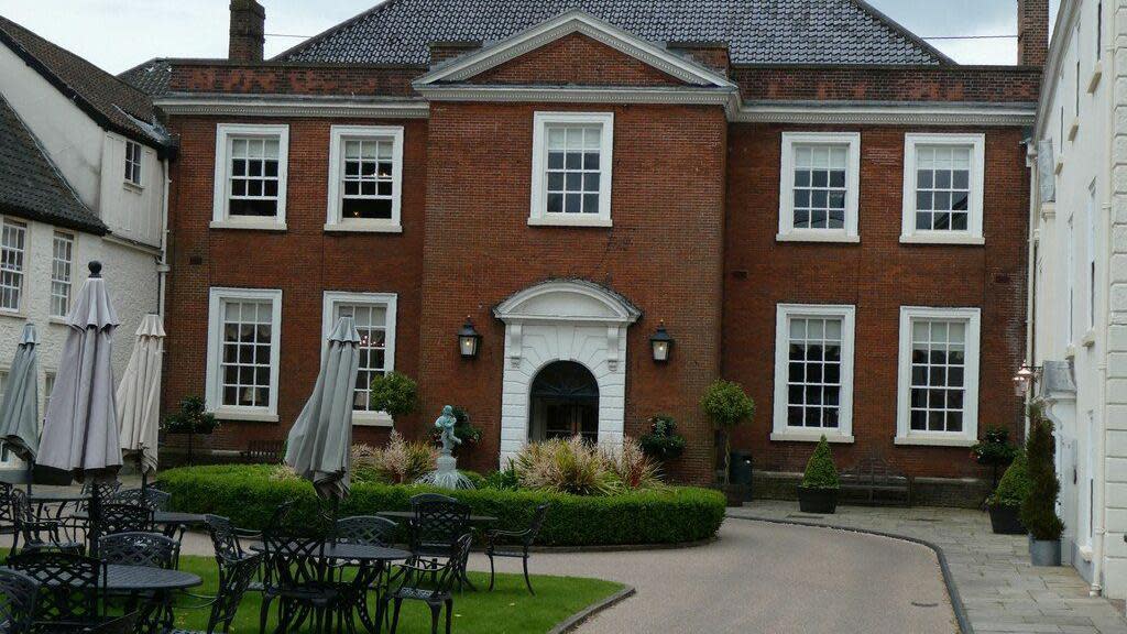 The Assembly House in Norwich, hotel and restaurant with tables and chairs outside front