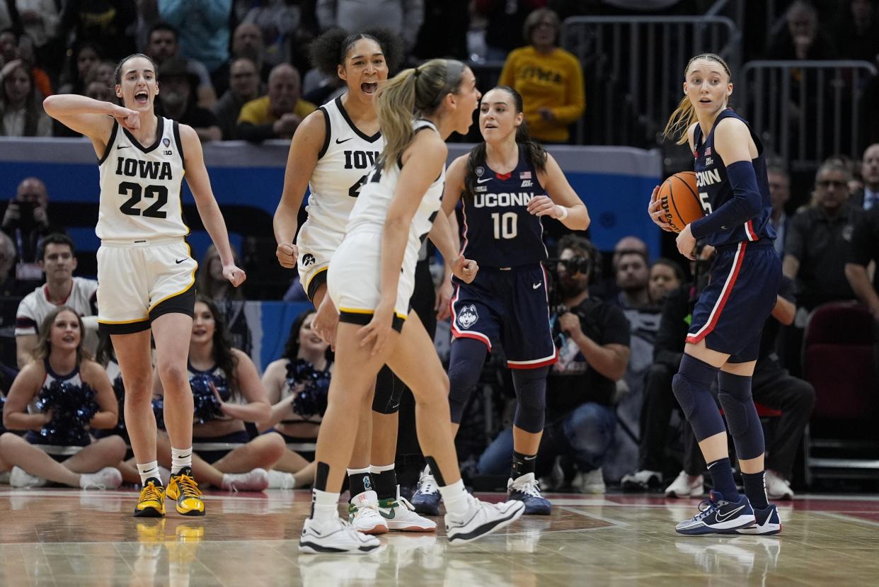 Iowa's Gabbie Marshall reacts after UConn's Aaliyah Edwards was called for an offensive foul during the final seconds of the second half of the NCAA Women's Final Four semifinals basketball game Friday, April 5, 2024, in Cleveland. (AP Photo/Morry Gash)