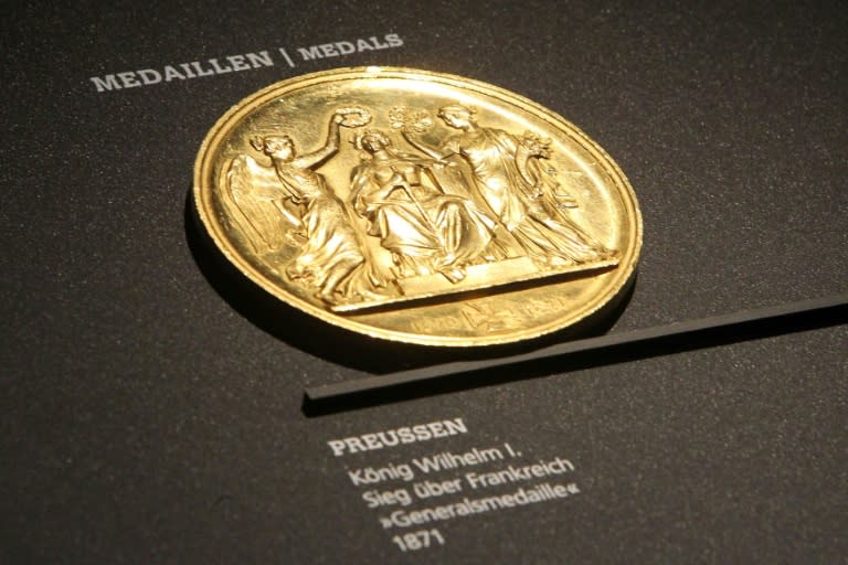 Out with the new, in with the gold: an 1871 medal on display at the Money Museum