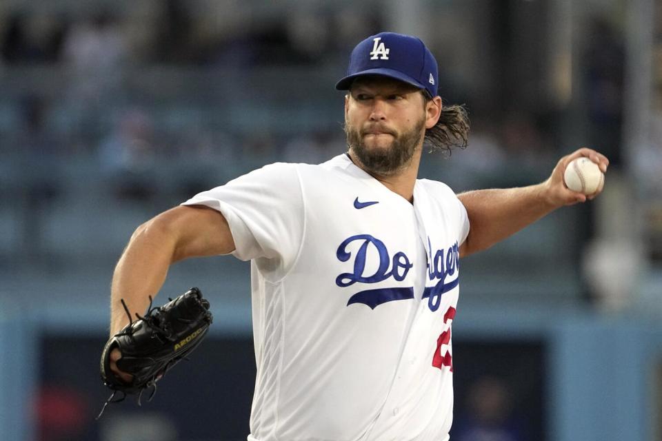 Dodgers starting pitcher Clayton Kershaw throws against the Milwaukee Brewers on Aug. 16, 2023, in Los Angeles.