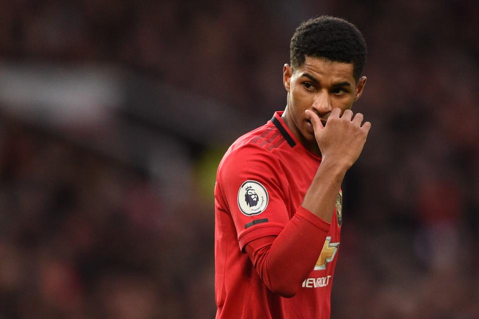 Manchester United's English striker Marcus Rashford reacts during the English Premier League football match between Manchester United and Norwich City at Old Trafford in Manchester, north west England, on January 11, 2020. (Photo by Oli SCARFF / AFP) / RESTRICTED TO EDITORIAL USE. No use with unauthorized audio, video, data, fixture lists, club/league logos or 'live' services. Online in-match use limited to 120 images. An additional 40 images may be used in extra time. No video emulation. Social media in-match use limited to 120 images. An additional 40 images may be used in extra time. No use in betting publications, games or single club/league/player publications. /  (Photo by OLI SCARFF/AFP via Getty Images)