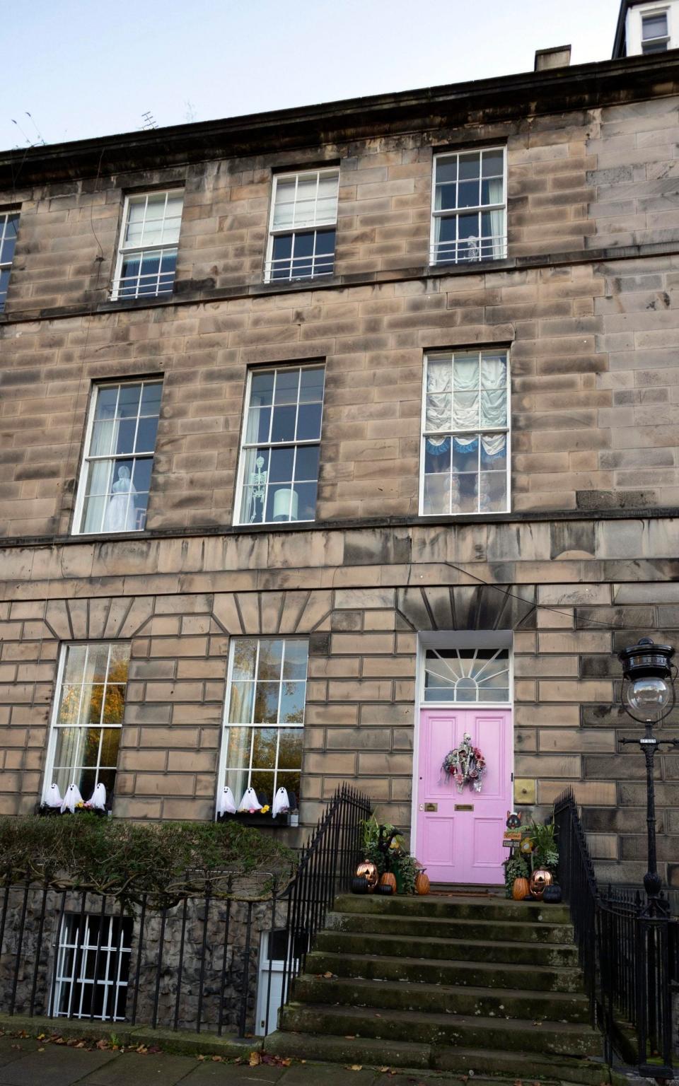 A spokesperson for the City of Edinburgh Council says the colour of the door 'is not in keeping with the historic character and appearance of this listed building' - Alan Simpson Photography