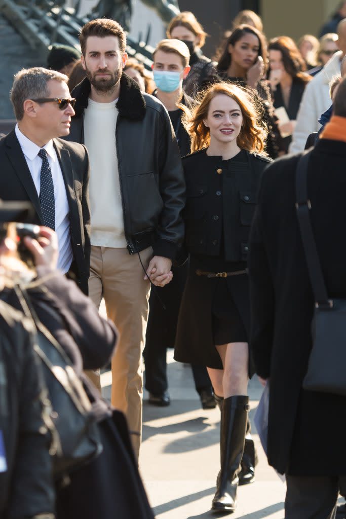 Emma Stone arrives with Dave McCary at Louis Vuitton’s Fall 2022 fashion show during Paris Fashion Week on March 7, 2022. - Credit: KCS Presse / MEGA