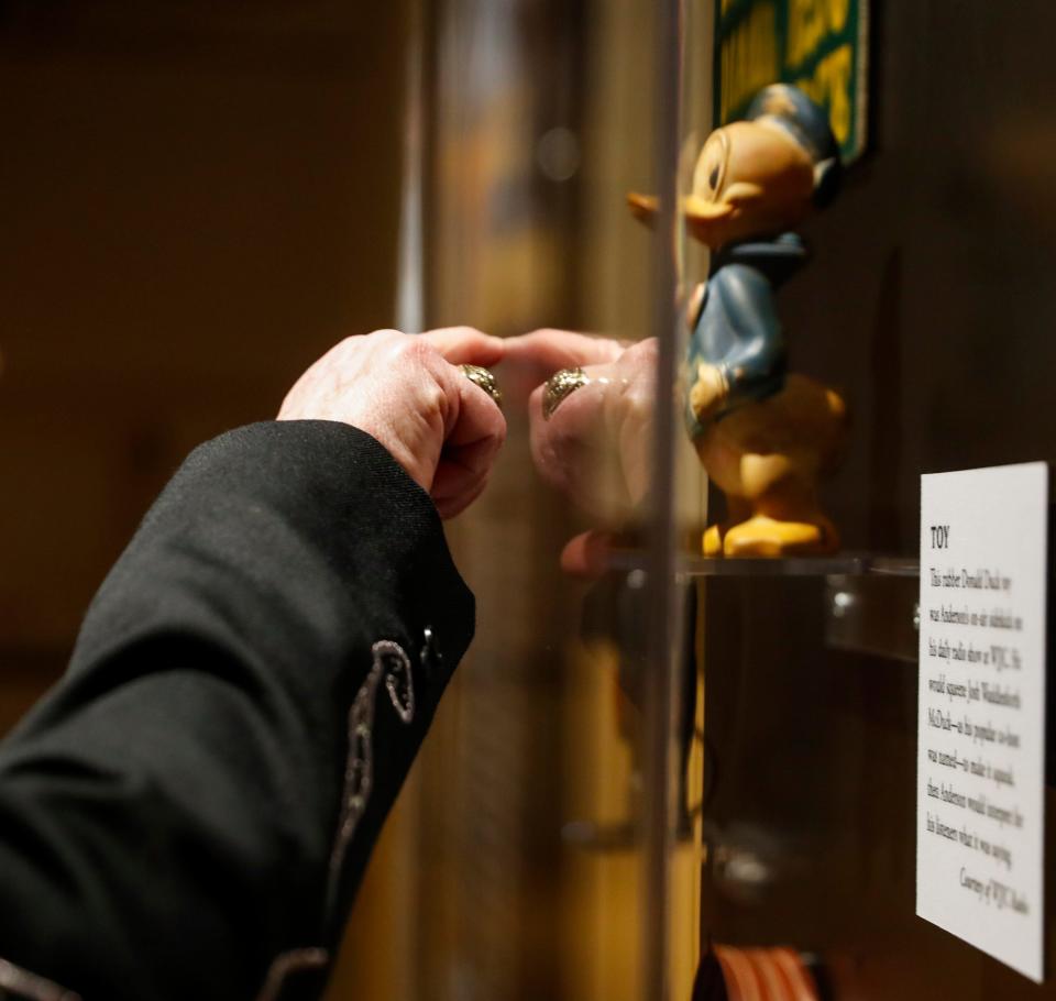 Bill Anderson points out Josh Waddlesforth McDuck, a co-host to his radio shows in Georgia from the beginning of his career at the new exhibit for Anderson titled "As Far as I can See" at the Country Music Hall of Fame in Nashville, Tenn., on Thursday, Dec. 2, 2021. 