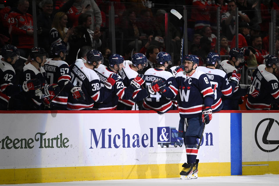 Washington Capitals left wing Alex Ovechkin (8) celebrates his first goal during the second period of an NHL hockey game against the Florida Panthers, Friday, Nov. 26, 2021, in Washington. (AP Photo/Nick Wass)