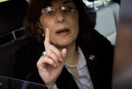 Bouthaina Shaaban, advisor to Syrian President Assad, gestures as she leaves after meeting with the Syrian opposition at the United Nations headquarters in Geneva, Switzerland, Switzerland, Monday, Jan. 27, 2014. Syria's opposition says there has been no progress on aid convoys reaching a besieged city in central Syria and the release of prisoners from government jails. (AP Photo/Anja Niedringhaus)