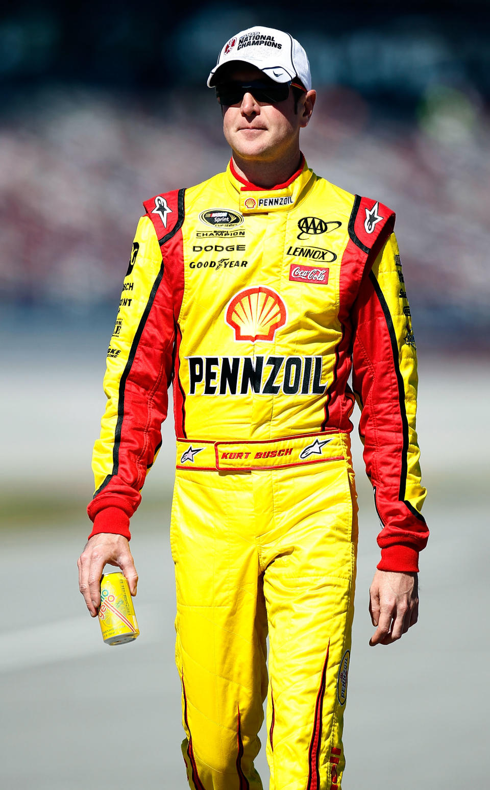 TALLADEGA, AL - OCTOBER 22: Kurt Busch, driver of the #22 Shell/Pennzoil Dodge, walks on pit road during qualifying for the NASCAR Sprint Cup Series Good Sam Club 500 at Talladega Superspeedway on October 22, 2011 in Talladega, Alabama. (Photo by Jeff Zelevansky/Getty Images for NASCAR)