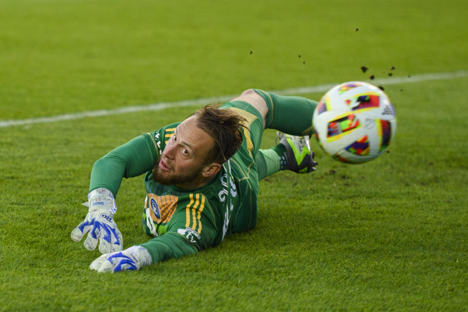 CF Montreal goalkeeper Jonathan Sirois (40) attempts to make a save against Toronto during the first half an MLS soccer game, Saturday, May 18, 2024 in Toronto (Chris Katsarov/The Canadian Press via AP)