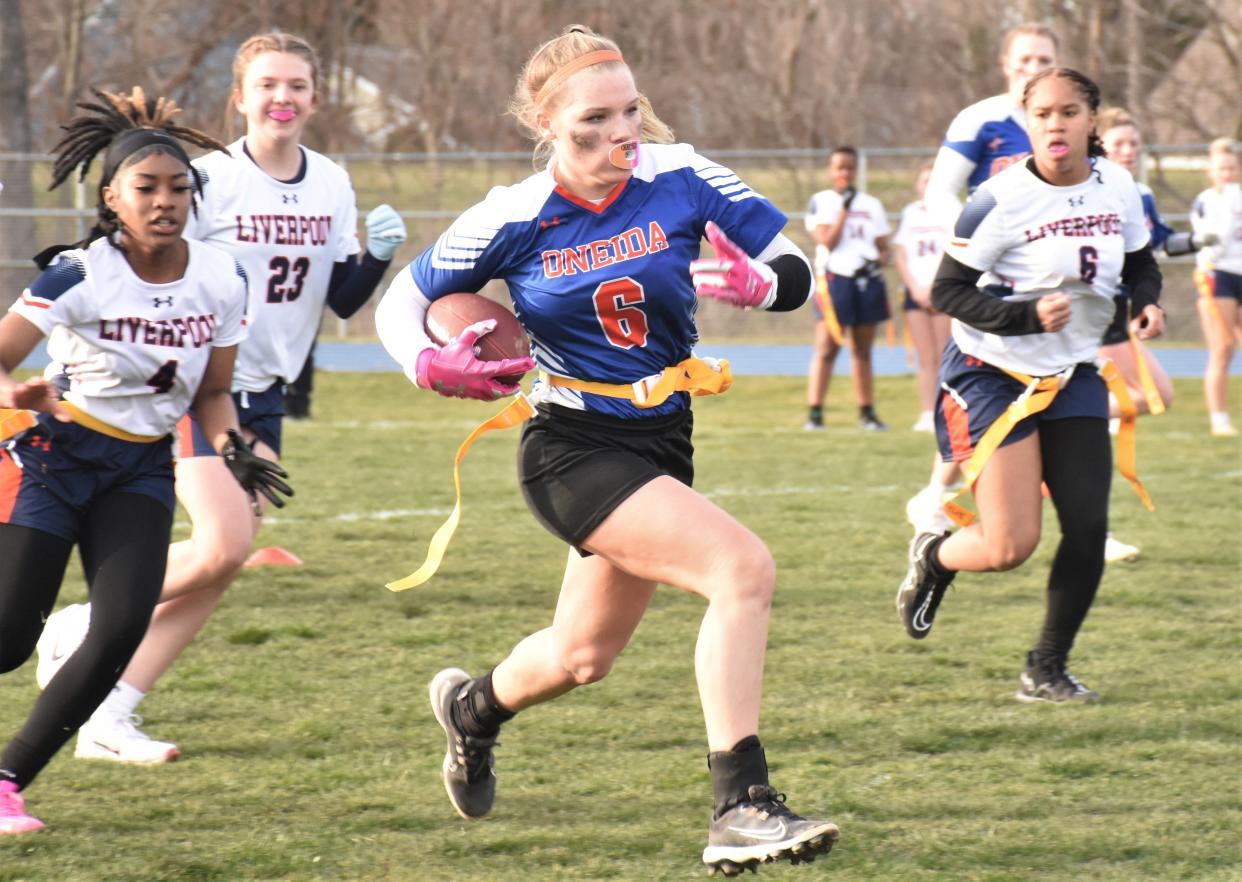 Raelyn Barlow runs with the ball for Oneida against Liverpool during Section III's inaugural interscholastic flag football game Monday.