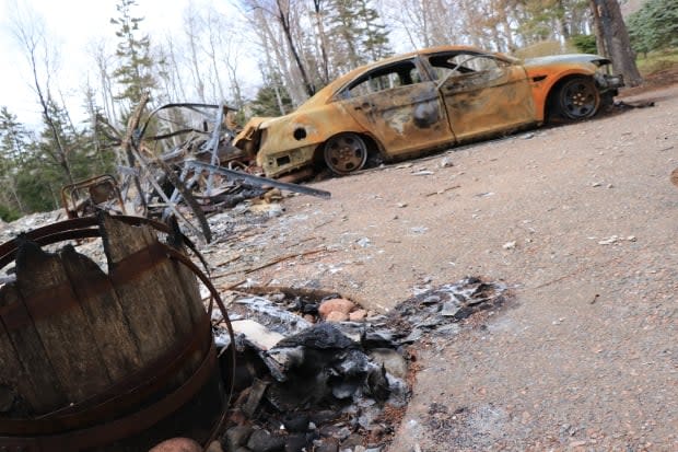 The burned out remains of the gunman's home on Portapique Beach Road, N.S., are seen in May 2020.  (Steve Lawrence/CBC - image credit)