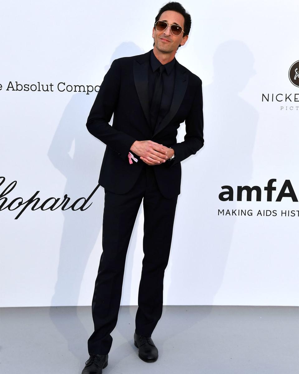 We should all aspire to feel as content in black tie as Adrien Brody seems to