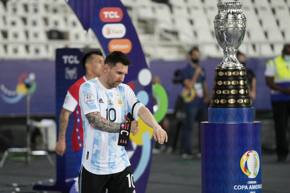 Argentina's Lionel Messi walks to the field for a Copa America soccer match against Chile at the Nilton Santos stadium in Rio de Janeiro, Brazil, Monday, June 14, 2021. (AP Photo/Ricardo Mazalan)