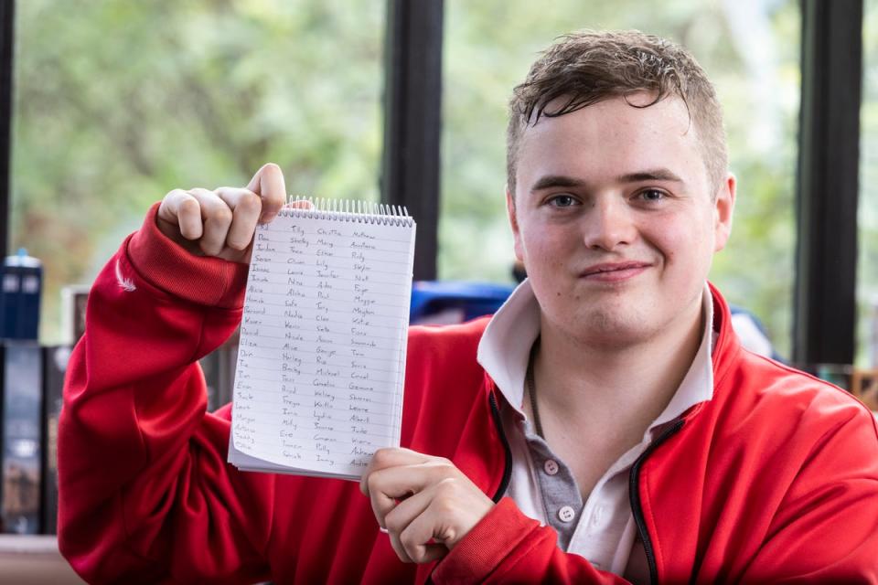 Henry hold a list of names from TikTok. He has been asking his subscribers to comment their names so he can see what their names taste or smell like (Lee McLean / SWNS)