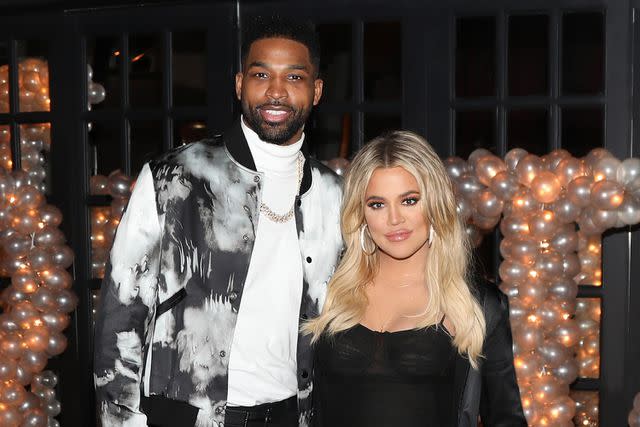 <p>Jerritt Clark/Gett</p> (L-R) Tristan Thompson and Khloe Kardashian pose for a photo as Remy Martin celebrates Tristan Thompson's Birthday at Beauty & Essex on March 10, 2018 in Los Angeles, California