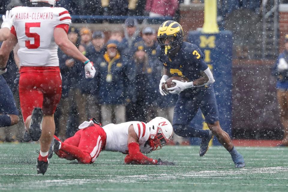 Michigan wide receiver A.J. Henning (3) returns a punt against Nebraska during the first half at Michigan Stadium in Ann Arbor on Saturday, Nov. 12, 2022.