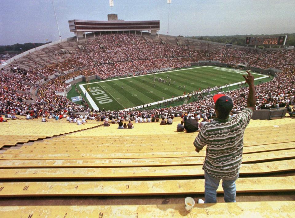 A lone fan cheers on the Tennessee Oilers in Memphis. (AP)