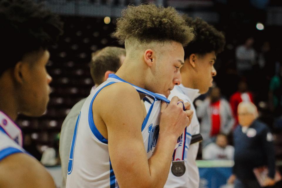 Father Tolton's Tahki Chievous is overwhelmed by emotion on March 19, 2022, as the Trailblazers walk off the court after their 57-49 loss to Vashon in the MSHSAA Class 4 state championship game in Springfield, Mo,
