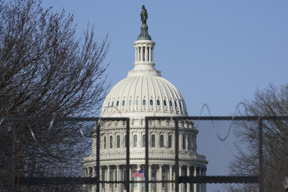 Security fencing surrounds Capitol Hill in Washington, Thursday, March 4, 2021. Capitol Police say they have uncovered intelligence of a "possible plot" by a militia group to breach the U.S. Capitol on Thursday, nearly two months after a mob of supporters of then-President Donald Trump stormed the iconic building to try to stop Congress from certifying now-President Joe Biden's victory. (AP Photo/Susan Walsh)