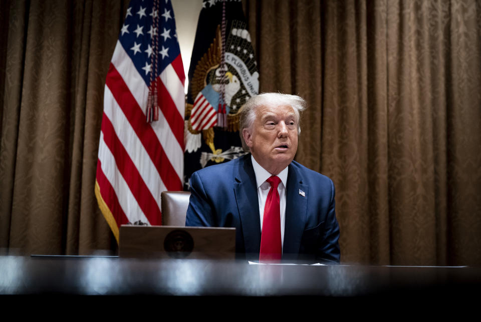WASHINGTON, DC - AUGUST 03: U.S. President Donald Trump makes remarks as he meets with U.S. Tech Workers and signs an Executive Order on Hiring Americans, in the Cabinet Room of the White House on August 3, 2020 in Washington, DC. The executive order bans federal agencies from firing American citizens or green card holders and hiring foreign workers to do their jobs. (Photo by Doug Mills-Pool/Getty Images)