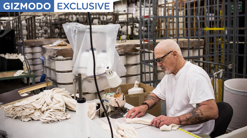 An inmate making $0.70 per hour sews socks together in a prison factory at California Men’s Colony prison on December 19, 2013 in San Luis Obispo, California.