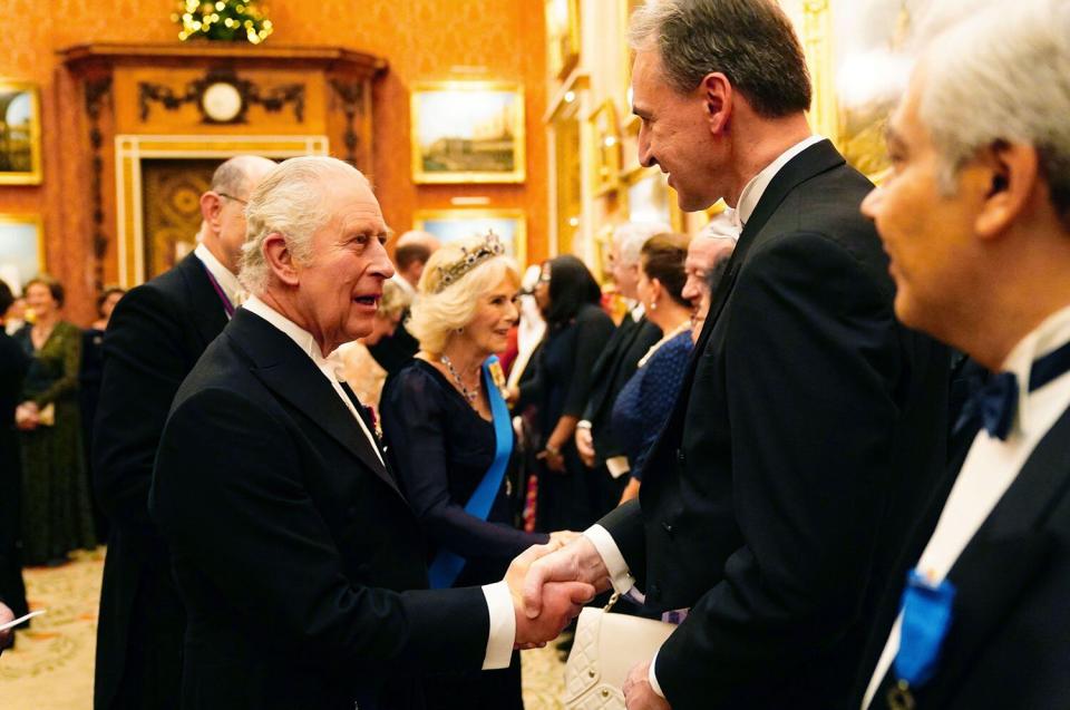 2M0JE2G King Charles III (left) during a Diplomatic Corps reception at Buckingham Palace in London. Picture date: Tuesday December 6, 2022.