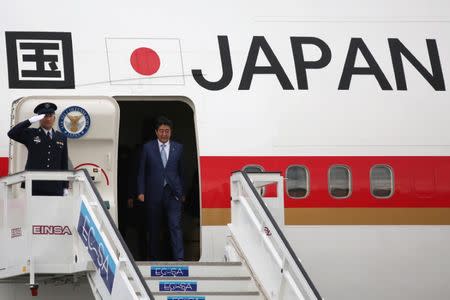 Japan's Prime Minister Shinzo Abe arrives at the Jose Marti International Airport in Havana, Cuba, September 22, 2016. REUTERS/Alexandre Meneghini