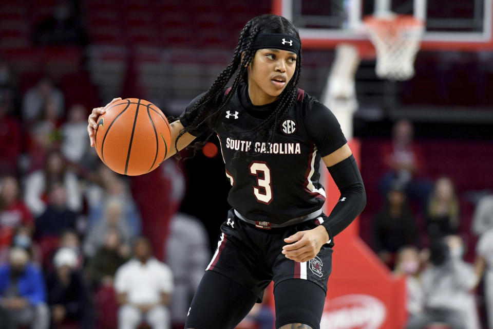 South Carolina guard Destanni Henderson (3) runs a play against Arkansas during the second half of an NCAA college basketball game Sunday, Jan. 16, 2022, in Fayetteville, Ark. (AP Photo/Michael Woods)