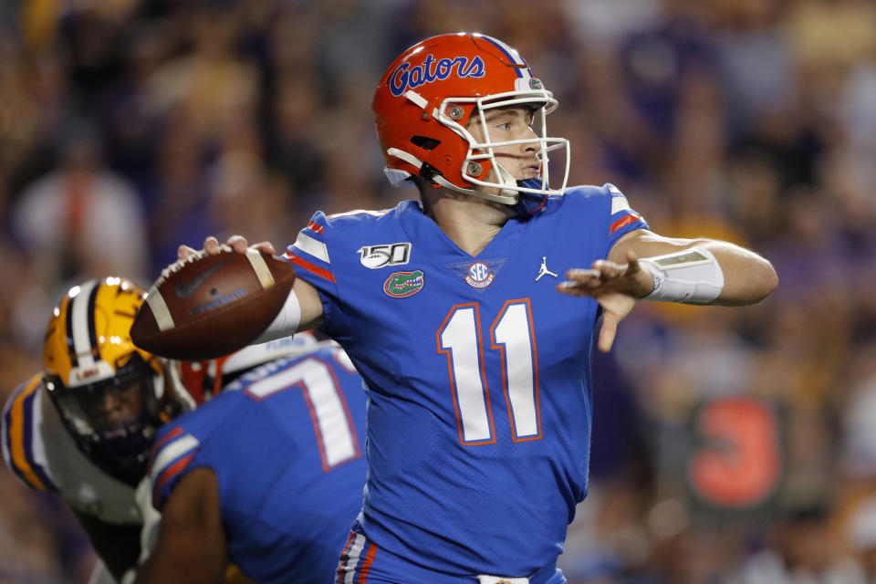 Florida quarterback Kyle Trask (11) passes in the first half of an NCAA college football game against LSU in Baton Rouge, La., Saturday, Oct. 12, 2019. (AP Photo/Gerald Herbert)