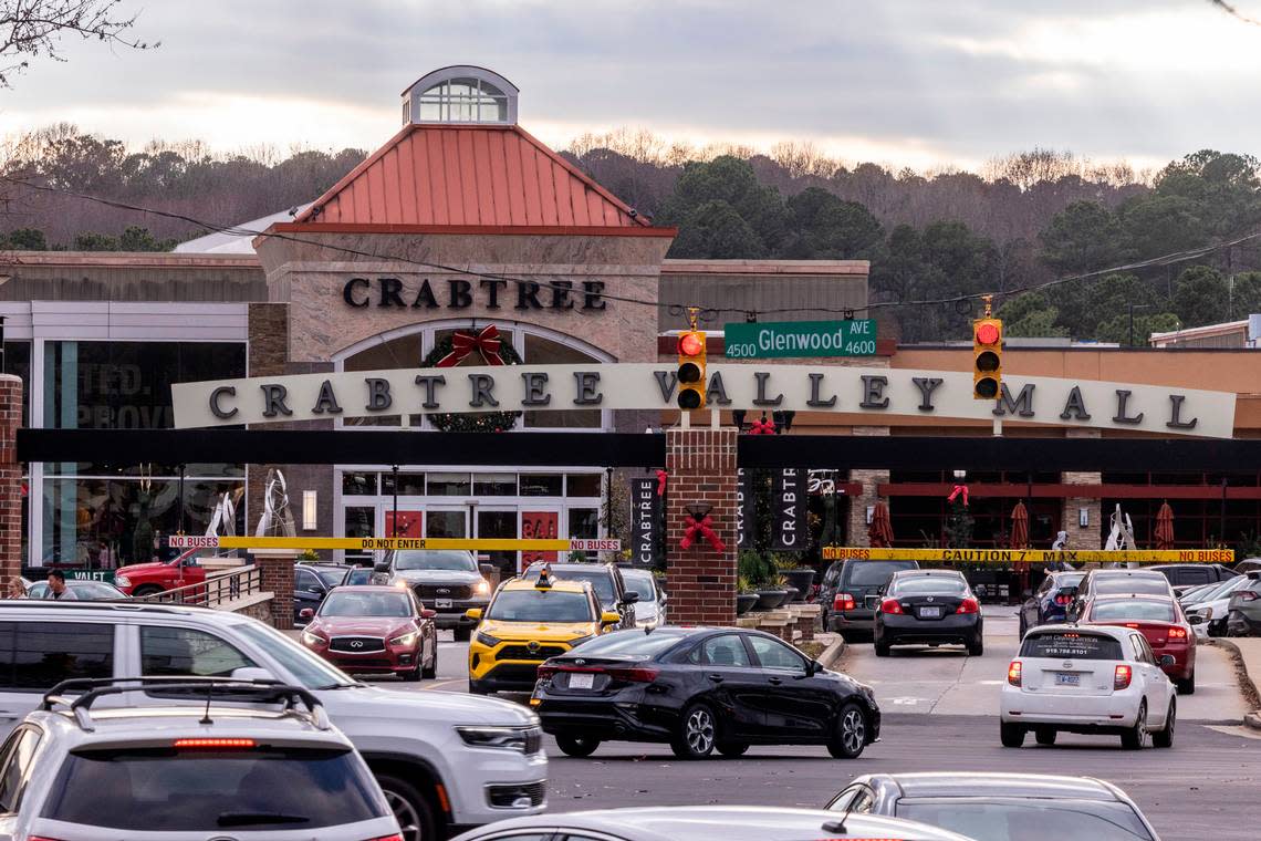 Holiday shoppers drive through the entrance of Crabtree Valley Mall on Glenwood Avenue in Raleigh Monday, Dec 12, 2022. The mall has been for sale on the market for nearly a year. Travis Long/tlong@newsobserver.com