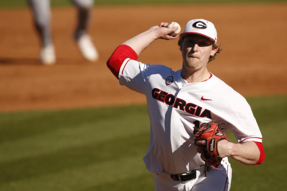 Georgia's Cole Wilcox (13) throws a pitch during an NCAA baseball game between Massachusetts and Georgia in Athens, Ga., on Saturday, March 7, 2020. Georgia won 16-2.