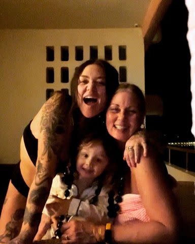 <p>Elle King Instagram</p> Elle King with her mom London King and son Lucky in Hawaii in January 2024.