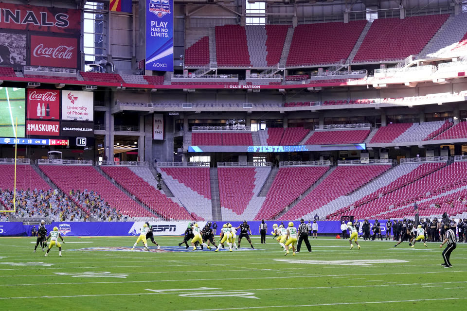 Iowa State and Oregon compete during the first half of the Fiesta Bowl NCAA college football game, Saturday, Jan. 2, 2021, in Glendale, Ariz. (AP Photo/Ross D. Franklin)