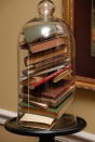 Take inspiration from ‘Beauty and the Beast’ and display your books in a huge bell jar. Only problem is you may struggle to find the one you want to read… [Photo: Pinterest]