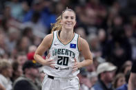 New York Liberty guard Sabrina Ionescu (20) reacts after making a three-point basket in the second half of a WNBA basketball game against the Indiana Fever, Thursday, May 16, 2024, in Indianapolis. (AP Photo/Michael Conroy)