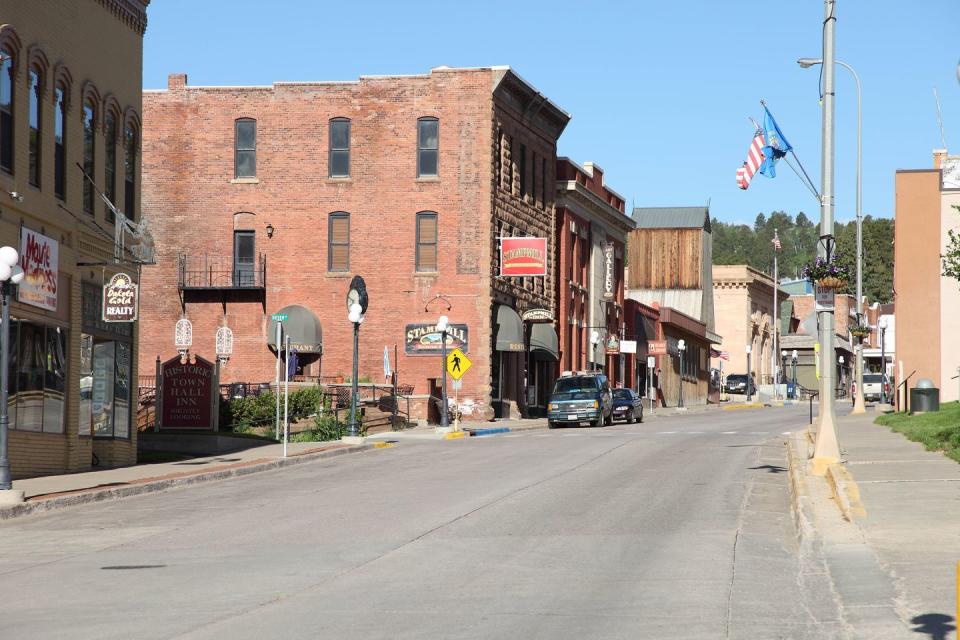 <p>If Mount Rushmore is on your bucket list, skip the bustling Rapid City and stay at <a href="https://www.tripadvisor.com/Tourism-g54680-Lead_South_Dakota-Vacations.html" rel="nofollow noopener" target="_blank" data-ylk="slk:this quieter escape;elm:context_link;itc:0;sec:content-canvas" class="link ">this quieter escape</a> instead. It was once a mining town, but has since lost the gold and kept the charm. Visit the Black Hills Mining Museum to gain a deeper appreciation of the town's history.</p>