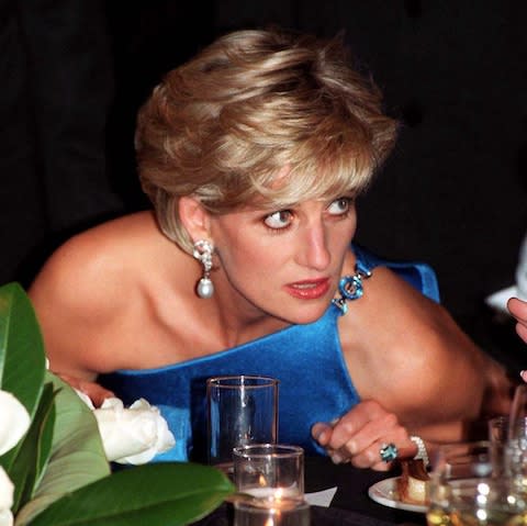 Princess Diana wearing the emerald cut aquamarine ring at the Victor Chang charity dinner in Sydney in 1996 - Credit: PA