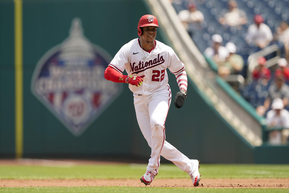 Washington Nationals' Juan Soto takes a lead from first base in the first inning of the first game of a baseball doubleheader against the Seattle Mariners, Wednesday, July 13, 2022, in Washington. (AP Photo/Patrick Semansky)