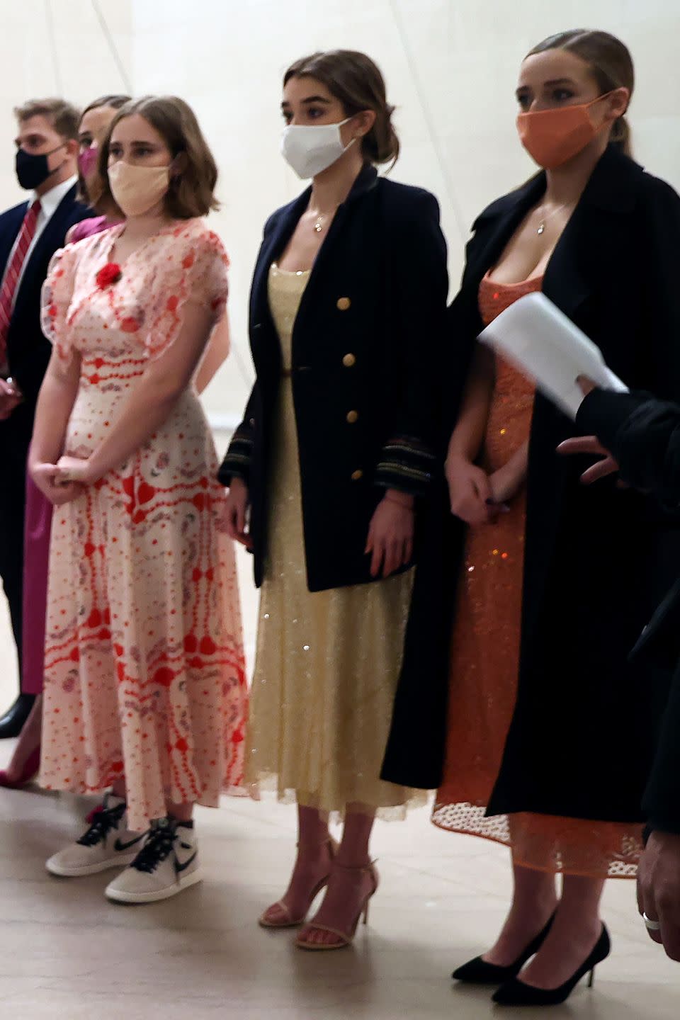 <p>Granddaughters Natalie and Finnegan Biden both wore cocktail dresses by NYC-based brand <a href="https://markarian-nyc.com/" rel="nofollow noopener" target="_blank" data-ylk="slk:Markarian;elm:context_link;itc:0;sec:content-canvas" class="link ">Markarian</a>, while Maisy Biden teamed her <a href="https://shoprodarte.com/" rel="nofollow noopener" target="_blank" data-ylk="slk:Rodarte;elm:context_link;itc:0;sec:content-canvas" class="link ">Rodarte</a> dress with Nike high-top trainers. </p>