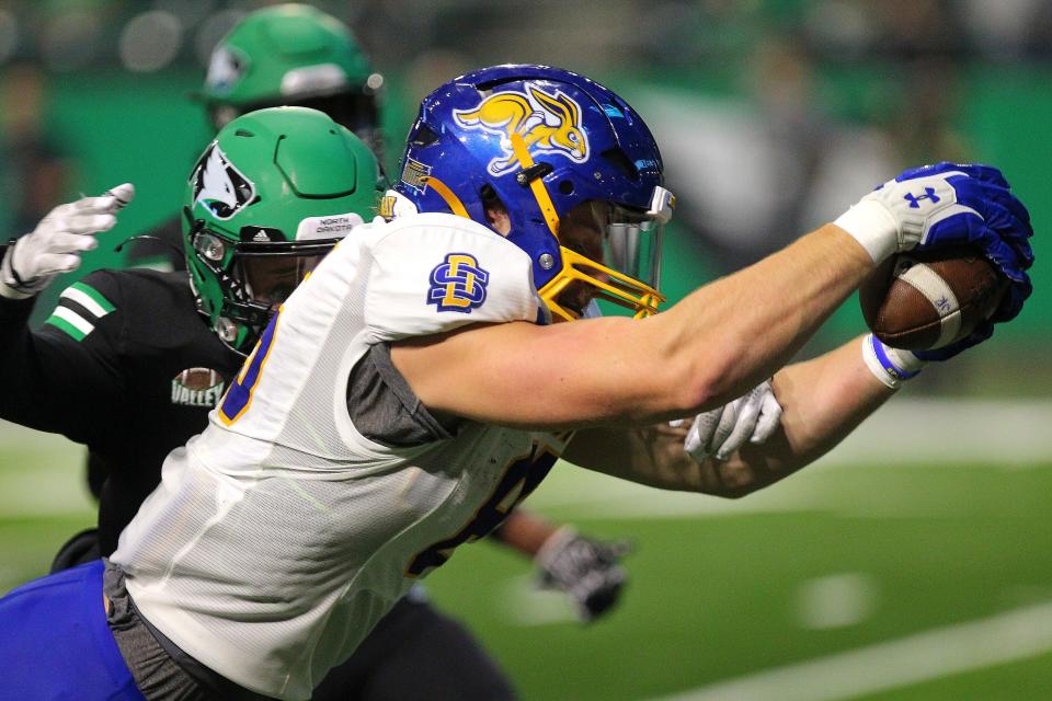 S.D. State tight end Tucker Kraft finds the end zone for a Jackrabbits touchdown in the second quarter of a college football matchup against the UND Fighting Hawks at the Alerus Center in Grand Forks on Saturday, October 22, 2022.