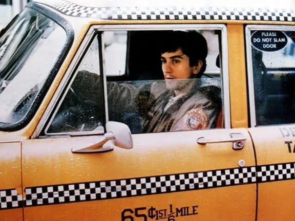 Travis Bickle at work in Taxi Driver.