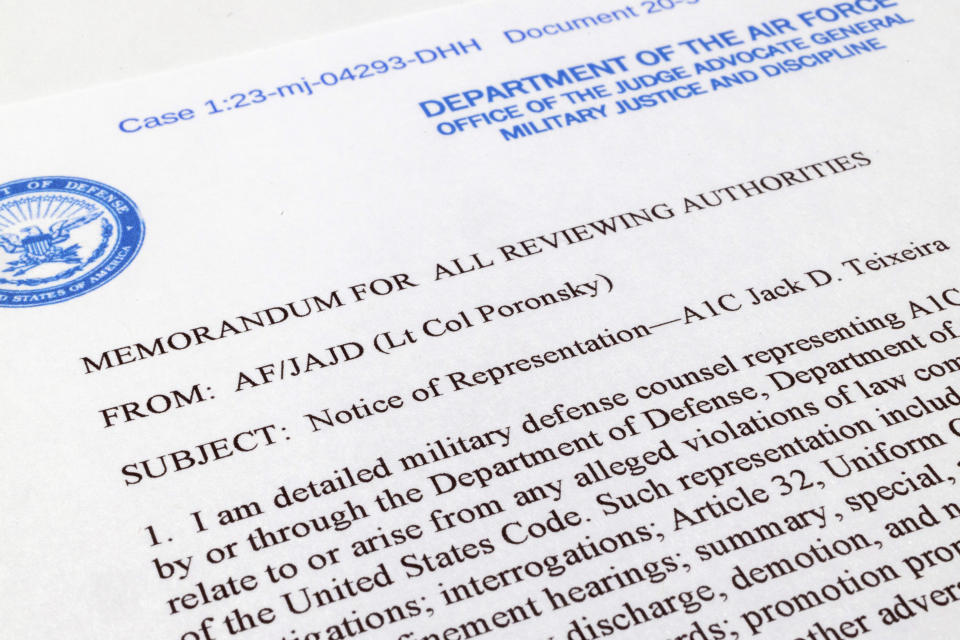 A memo from the Air Force appointing a military attorney for Jack Teixeira, contained in the defense motion for pretrial home confinement, is photographed Thursday, April 27, 2023. A judge has put off a decision on whether the Massachusetts Air National guardsman accused of leaking highly classified military documents should be held in jail until his trial. Prosecutors said Teixeira kept an arsenal of weapons and said on social media that he would like to kill a "ton of people." (AP Photo/Jon Elswick)